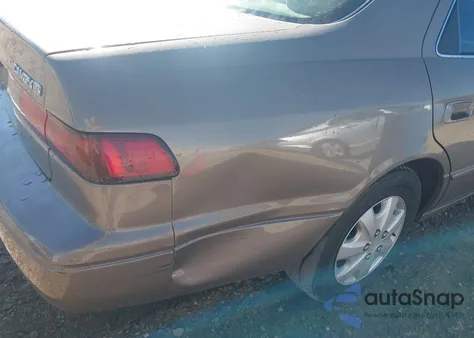 1999 Toyota Camry Le from USA, damaged, VIN JT2BG22K1X0376711